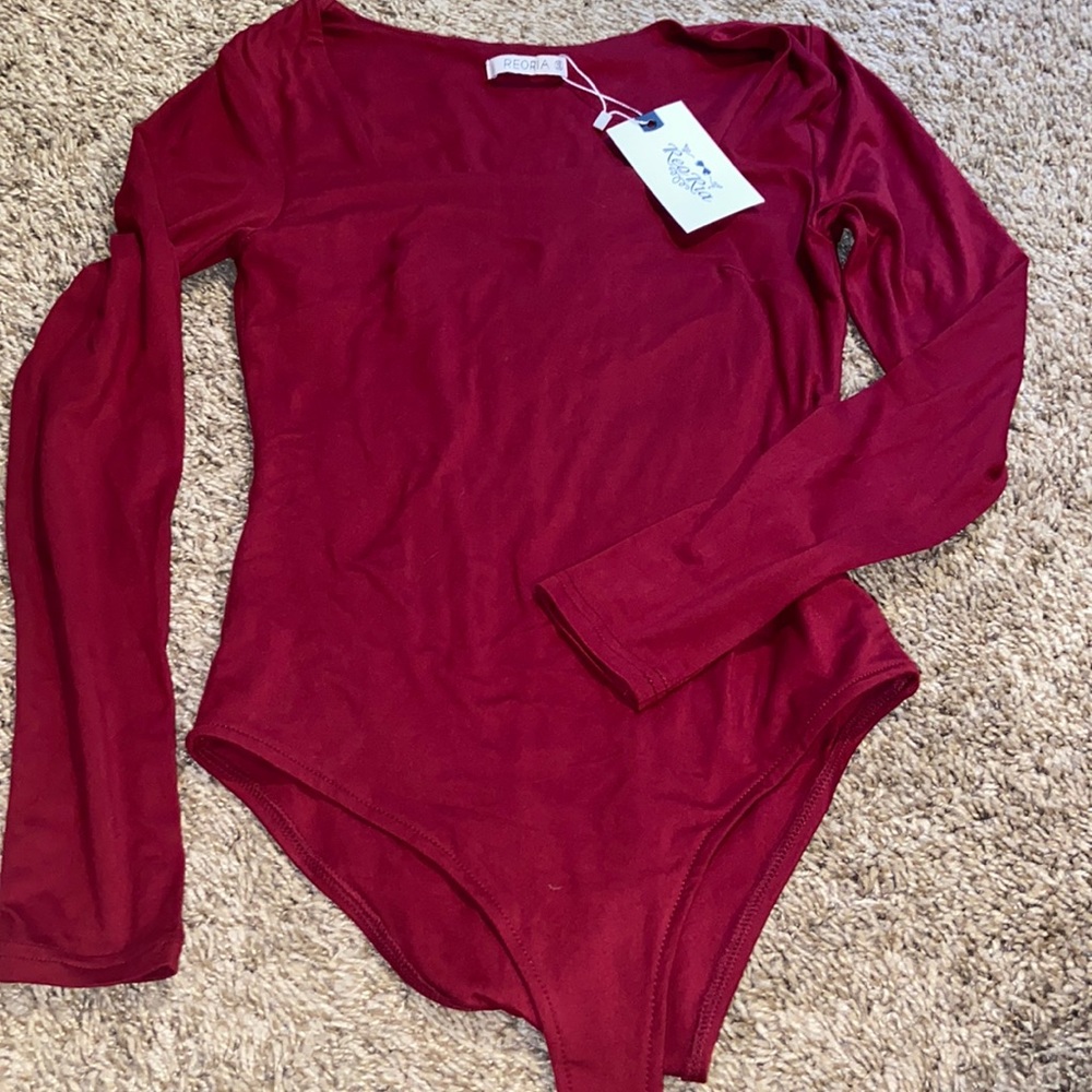 Butterfly soft body suit NEVER WORN